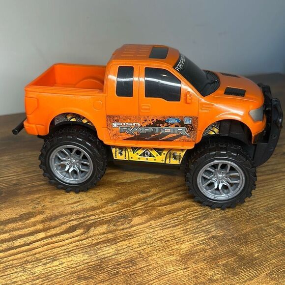 Ford F-150 Raptor Red Orange Plastic Truck set of 2 Made in China - Picture 3 of 9